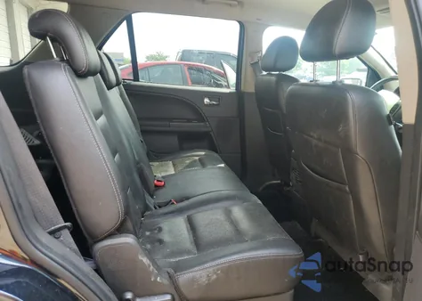 2008 Ford Taurus X Limited z USA, uszkodzony, nr VIN 1FMDK03W48GA01145